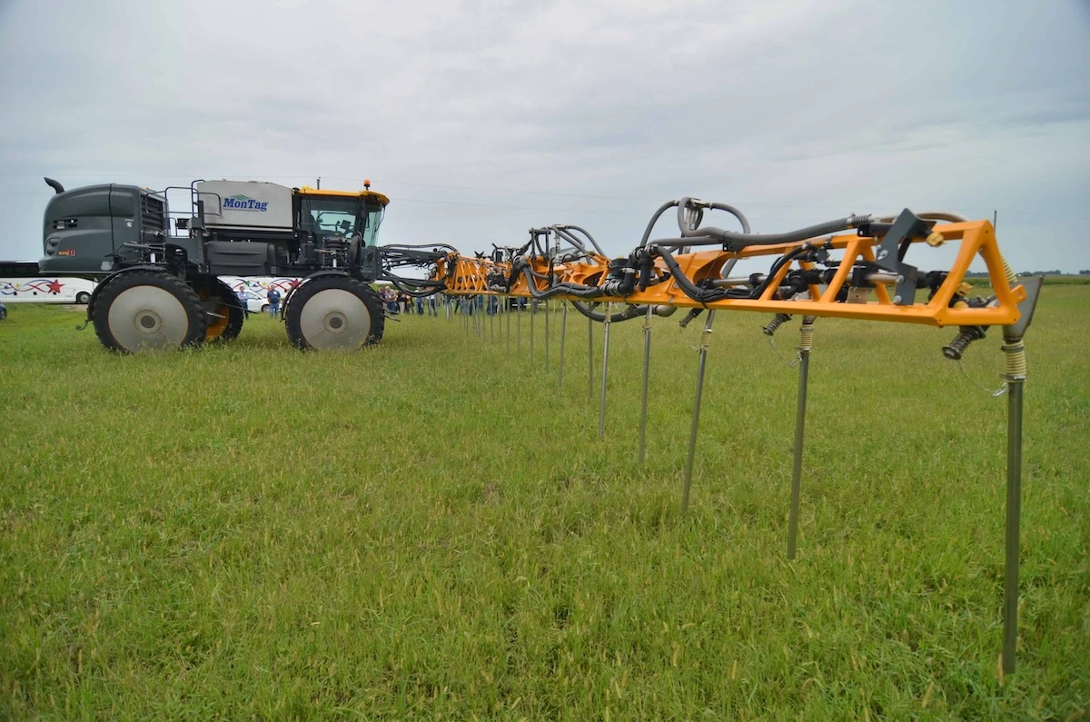 high boy tractor with cover crop application bar