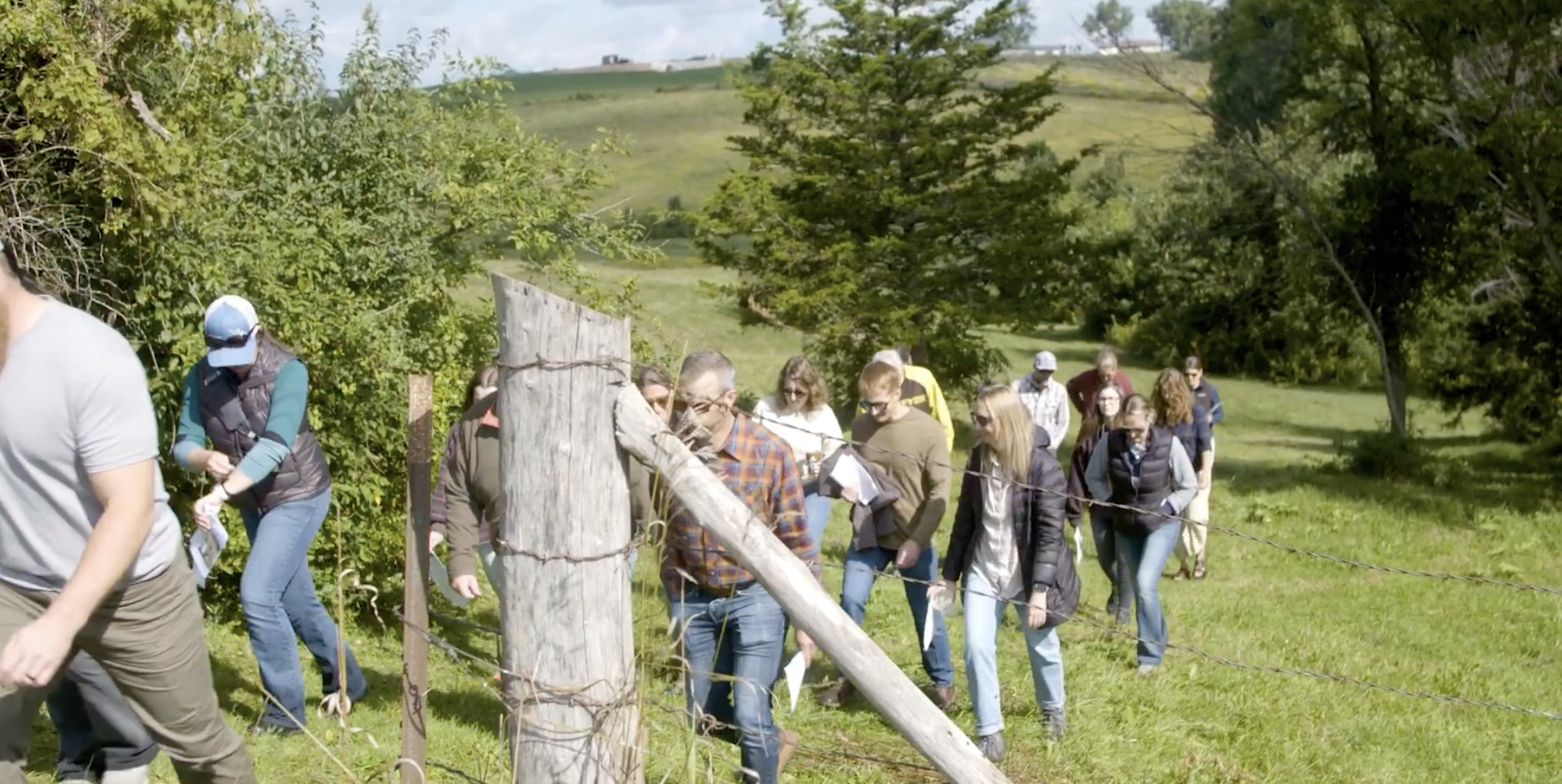 people climbing hill in wisconsin