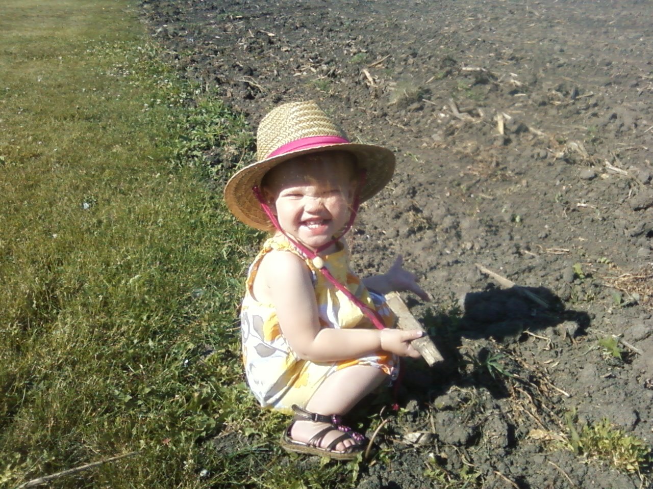 Little girl in soybean field