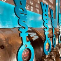West O Beer, Doll Distributing support Iowa Agriculture Water Alliance with “Blue Taps=Clean Water”