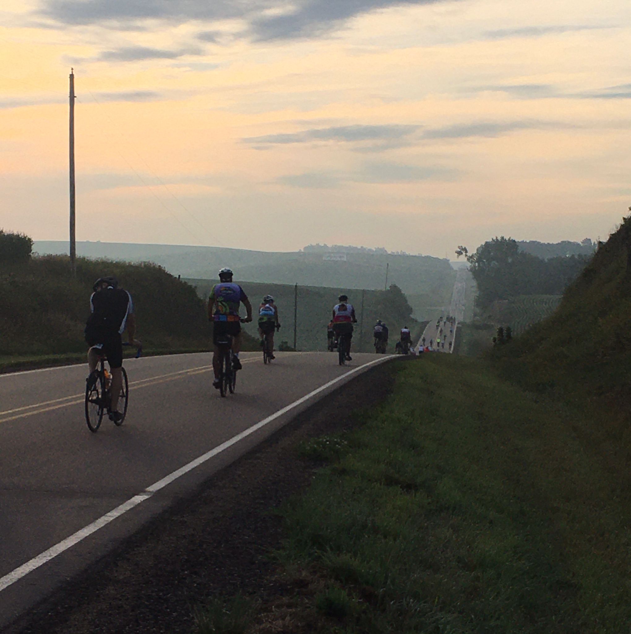 bikers during sunset 