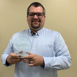 John Swanson with IAWA Circle of Excellence Award.